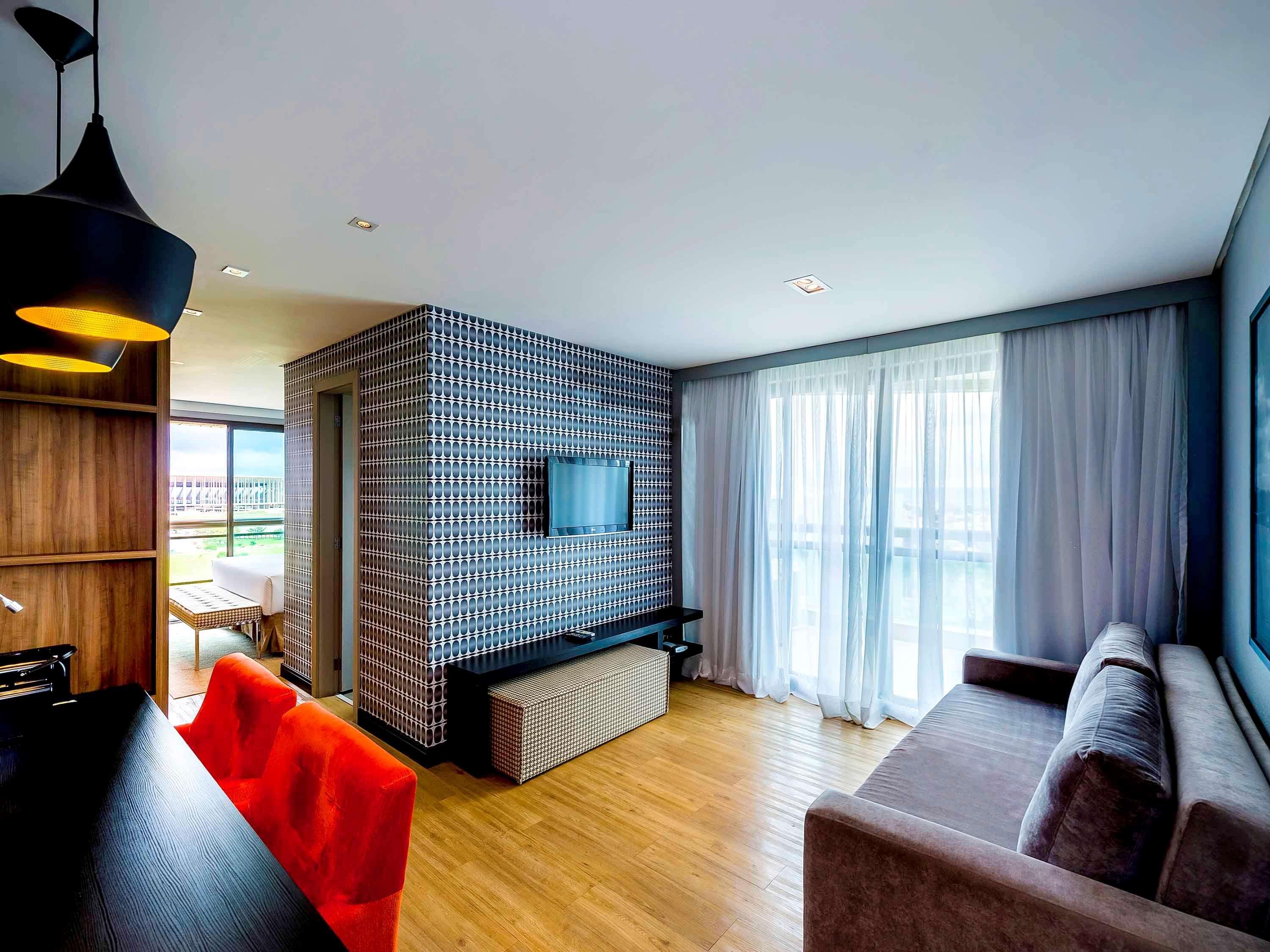 Grand Mercure Brasilia Eixo Monumental Exterior photo A living room in a typical apartment